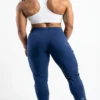 Make_her_wear_Whight_Sportbra,_202605072006 Original Gymshark Crest Joggers (Navy) size: Large