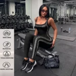 Woman_sitting_in_gym_2K_202609012202 MRS SXY Black and Silver Bodycon Jumpsuit halter backless design