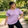 Edit_picture_background_park_2K_20261018012340 Woman wearing lavender textured active tee in the park