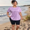 Enhance_picture_and_add_beach_2K_20261018012326 Lavender active tee relaxed fit outdoor beach style
