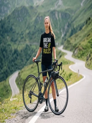 Break the Rules graphic print t-shirt in black worn by a female cyclist