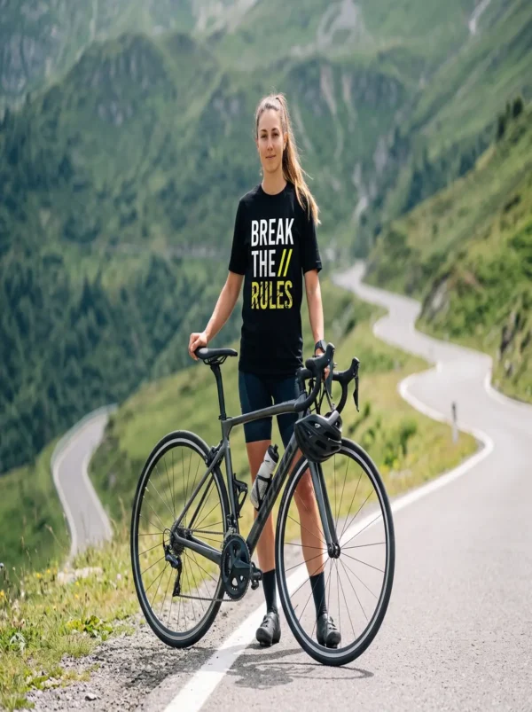 Break the Rules graphic print t-shirt in black worn by a female cyclist