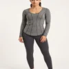 Female_model_posing_in_studio_2K_20261018181933 Heather grey long sleeve gym top with vertical contrast seams, studio view