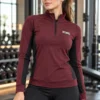 Victoria's Secret PINK Ultimate women's burgundy quarter zip athletic top front view
