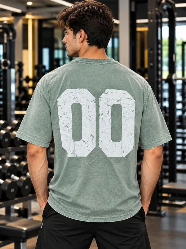 Sage green oversized graphic t-shirt with distressed 00 back print