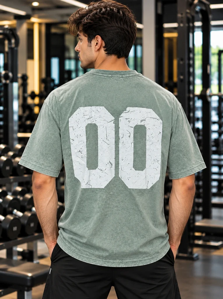 Sage green oversized graphic t-shirt with distressed 00 back print
