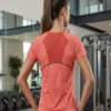 Back view of the Vibrant Energy V-neck mesh-back active tee showing the V-shaped mesh ventilation panel Back view of the Vibrant Energy V-neck mesh-back active tee showing the V-shaped mesh ventilation panel