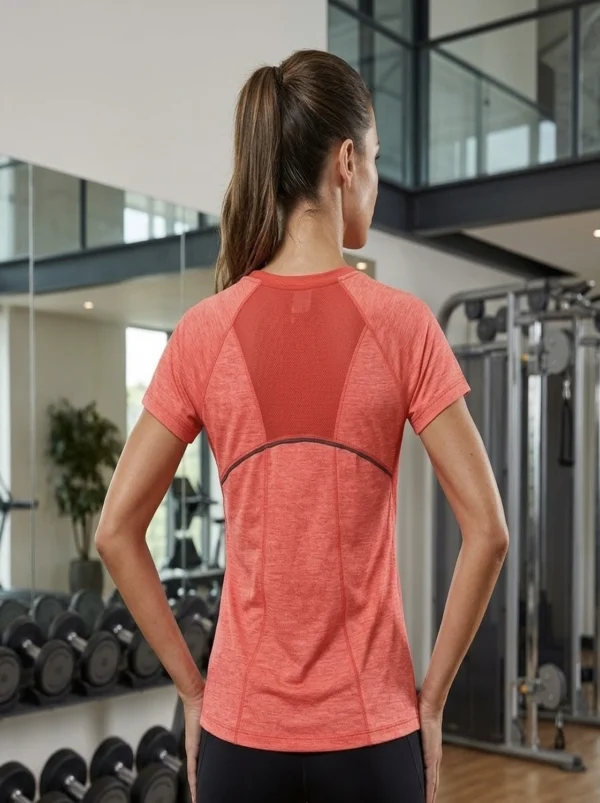 Back view of the Vibrant Energy V-neck mesh-back active tee showing the V-shaped mesh ventilation panel Back view of the Vibrant Energy V-neck mesh-back active tee showing the V-shaped mesh ventilation panel