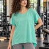 Women wearing the mint green mesh-panel high-low gym t-shirt, front view with round neck Women wearing the mint green mesh-panel high-low gym t-shirt, front view with round neck