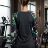 Neon Splash Raglan Active Top close-up of neon splash raglan sleeves and ribbed cuffs