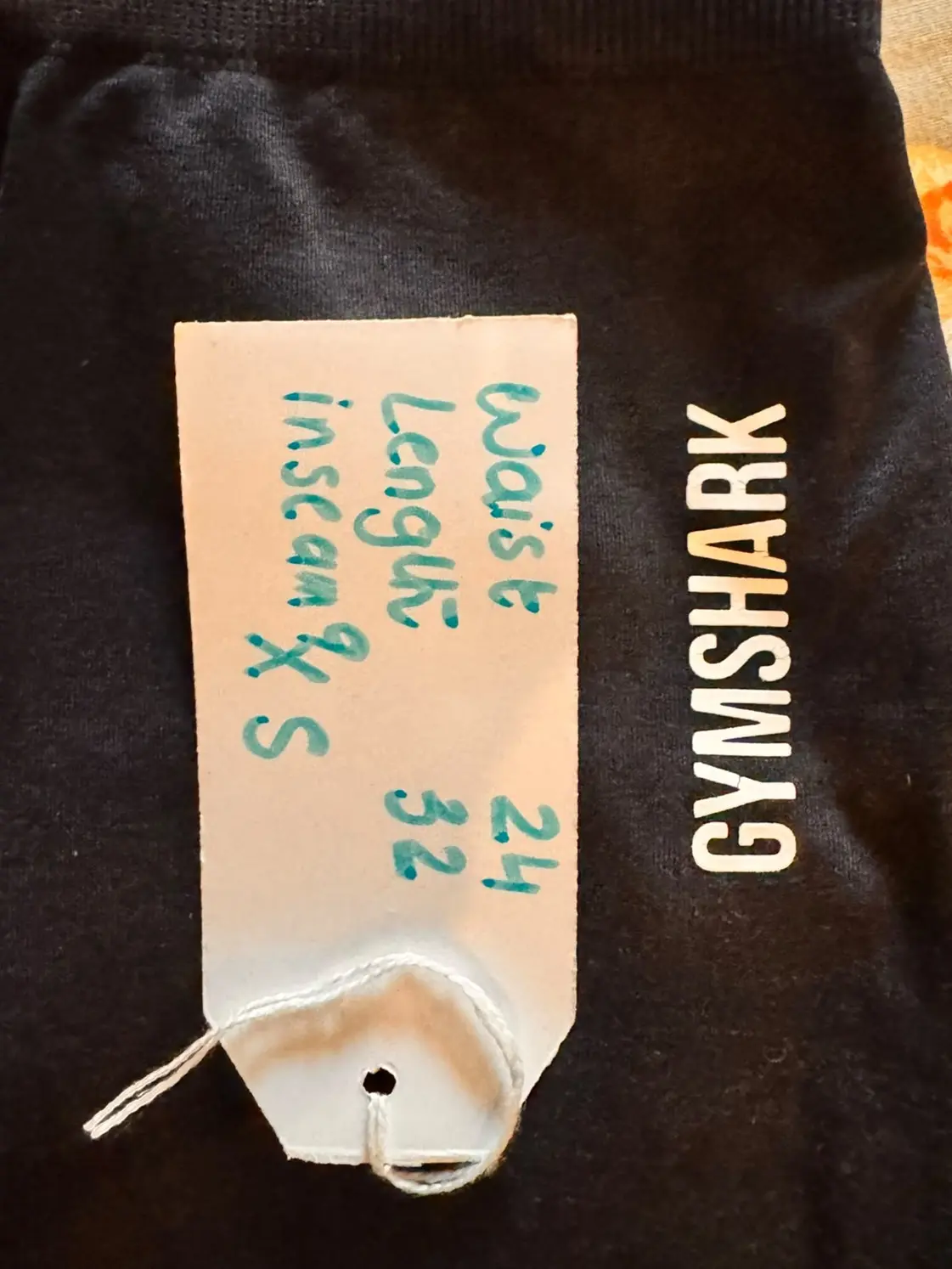 Pre-loved Gymshark women's charcoal grey high-waisted leggings full-length view