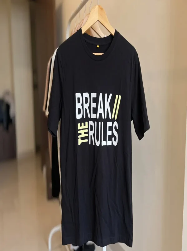 Black Break the Rules graphic print t-shirt on a hanger, front view