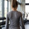 PRE-LOVED Lululemon Ruched V-Neck Athletic Long Sleeve Top Thumbhole sleeve detail on the ruched v-neck athletic long sleeve top